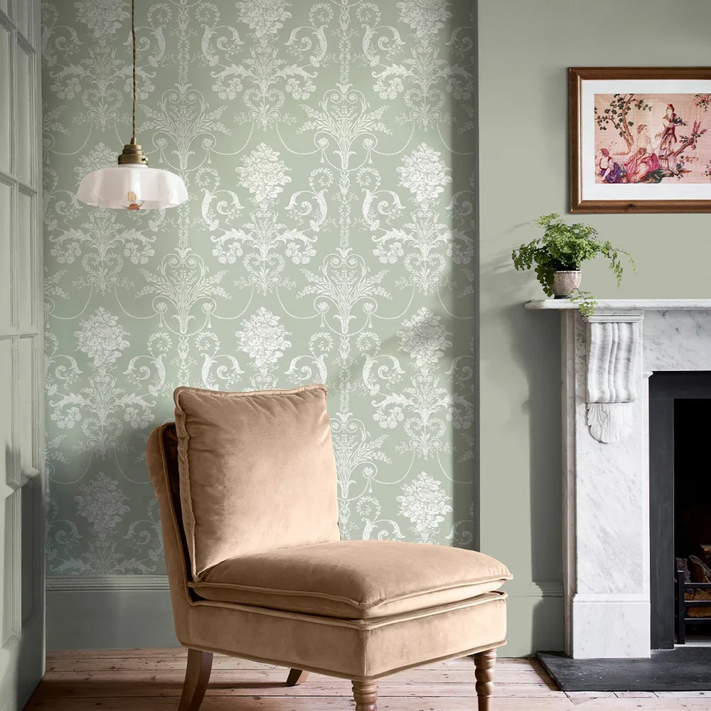 Josette Sage Green damask wallpaper by Laura Ashley in a styled interior