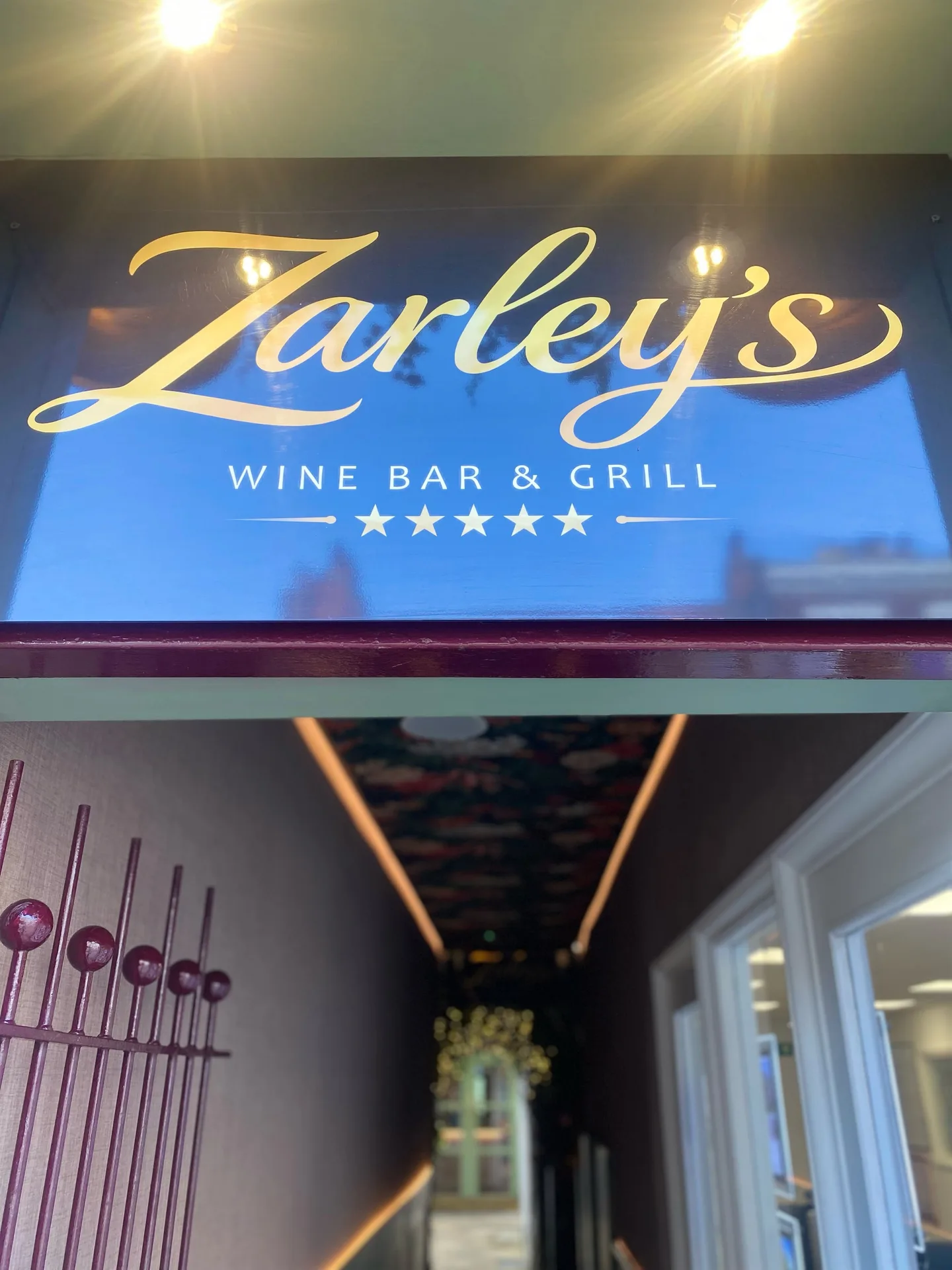 Zarleys Wine Bar and Grill sign in Beverley, with the corridor through to the new function room beyond