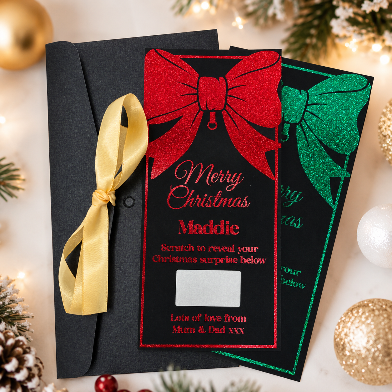 Personalised Christmas Reveal Ticket Bow with a foiled bow design and a scratch-off panel