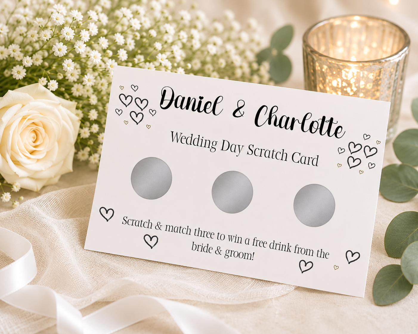 Personalised wedding favour scratch card in the heart design, with a scratch panel over the prize