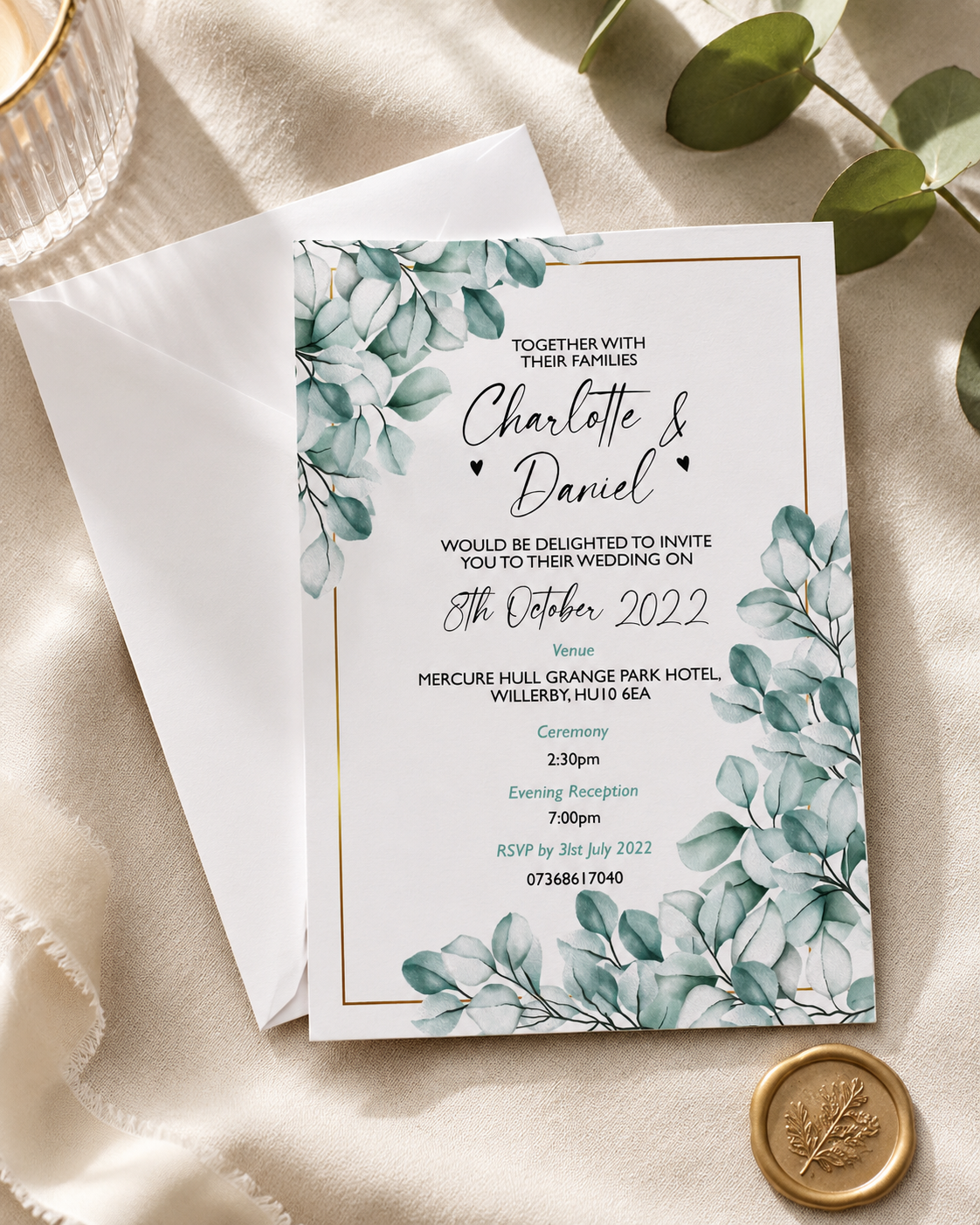 Close up of the textured 300gsm Gesso card and watercolour eucalyptus detail on a personalised wedding invitation